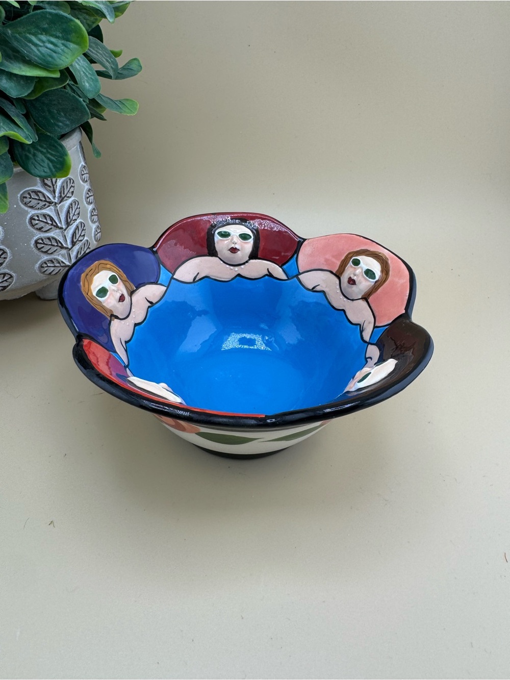 Hand-Painted Blue Ceramic Decorative Bowl with Figurative Border